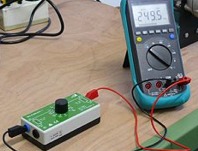 ISO-Kalibrator 1 Ohm Meters checking a multimeter