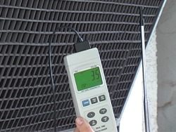 wind meters testing the air velocity of an extractor with the PCE-009 anemometer.
