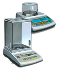 Scales for gold with protection against wind.