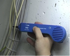 CableTracker LAN/Cable Analyser tracing a cable from the doorbell of a house