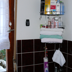 Image of the PCE-HT 71 climatological recorder being used in a bathroom. 