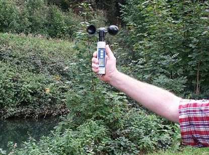 Testing winds speed with a PCE-A420 cup vane anemometer.