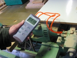 The PCE-P15 Differential Pressure Meter measuring presure in an industrial machine