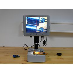 Here the miscroscope is inspecting a plate.