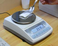 Balances for Analysis weighing a dose.