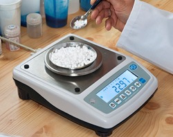 Balances for Analysis weighing a dose.