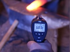 Testing the temperature of a work of forging with our temperature testers.