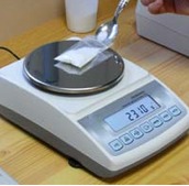 Scales for Colleges measuring doses.