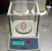 Scales for Colleges measuring the dose of a test tube.