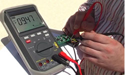 W-20-TRMS Digital voltmeter testing voltage.