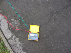 Earth resistance meter with three checking cables.