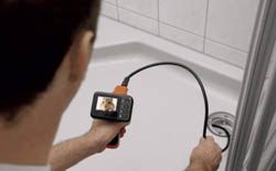 The PCE-DE 50 endoscope checking a sink.