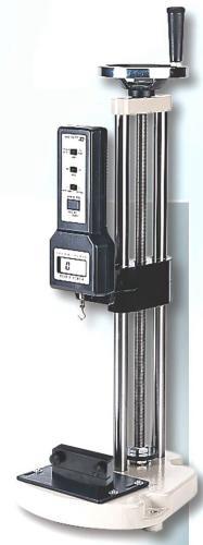 pictures shows teststand with force gauges fg and grip