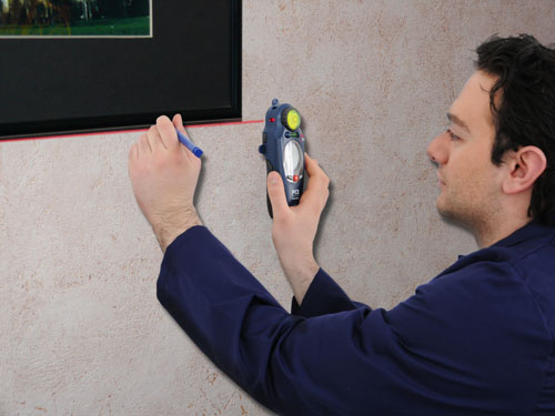 The PCE-STM 3 multifunction wall scaner testing with the laser component.